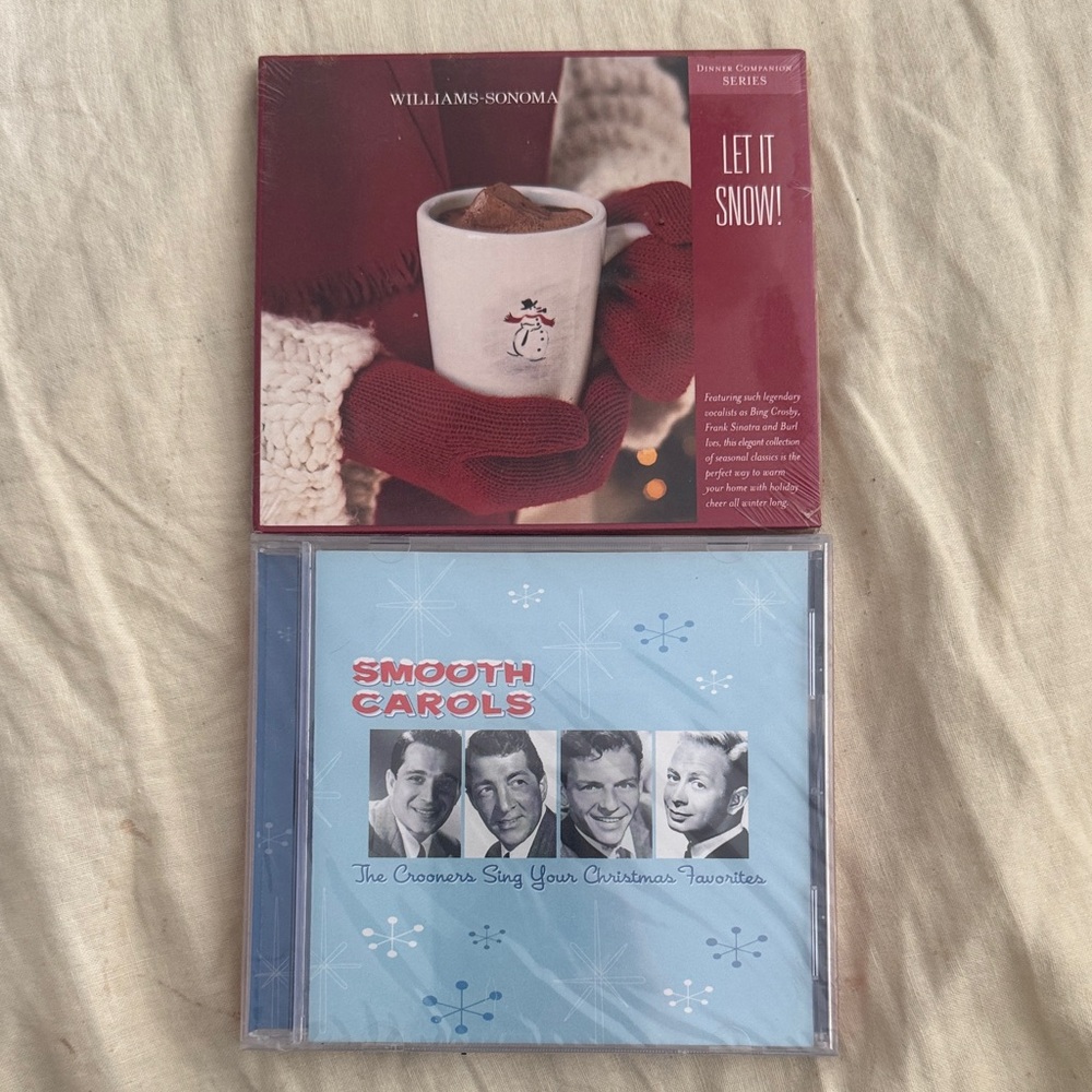 Two holiday CDs never opened.